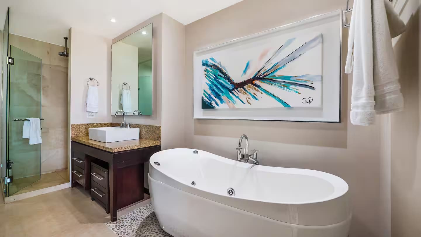 The luxurious master bath has jacuzzi tub and walk-in shower