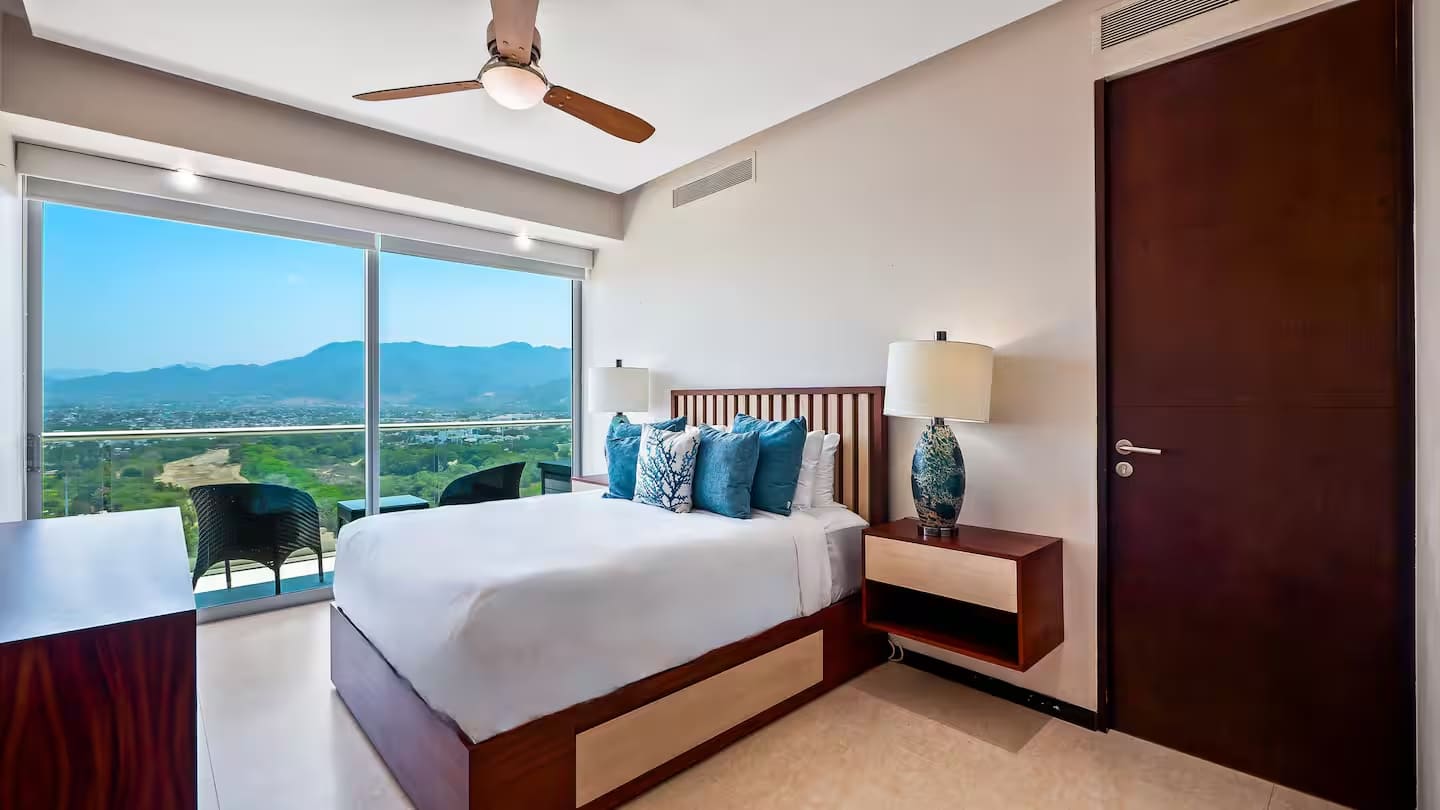 Bedroom 2 has a queen sized bed and custom furniture