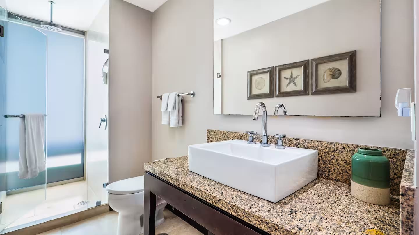 The second bedroom has an en-suite bathroom with walk-in shower