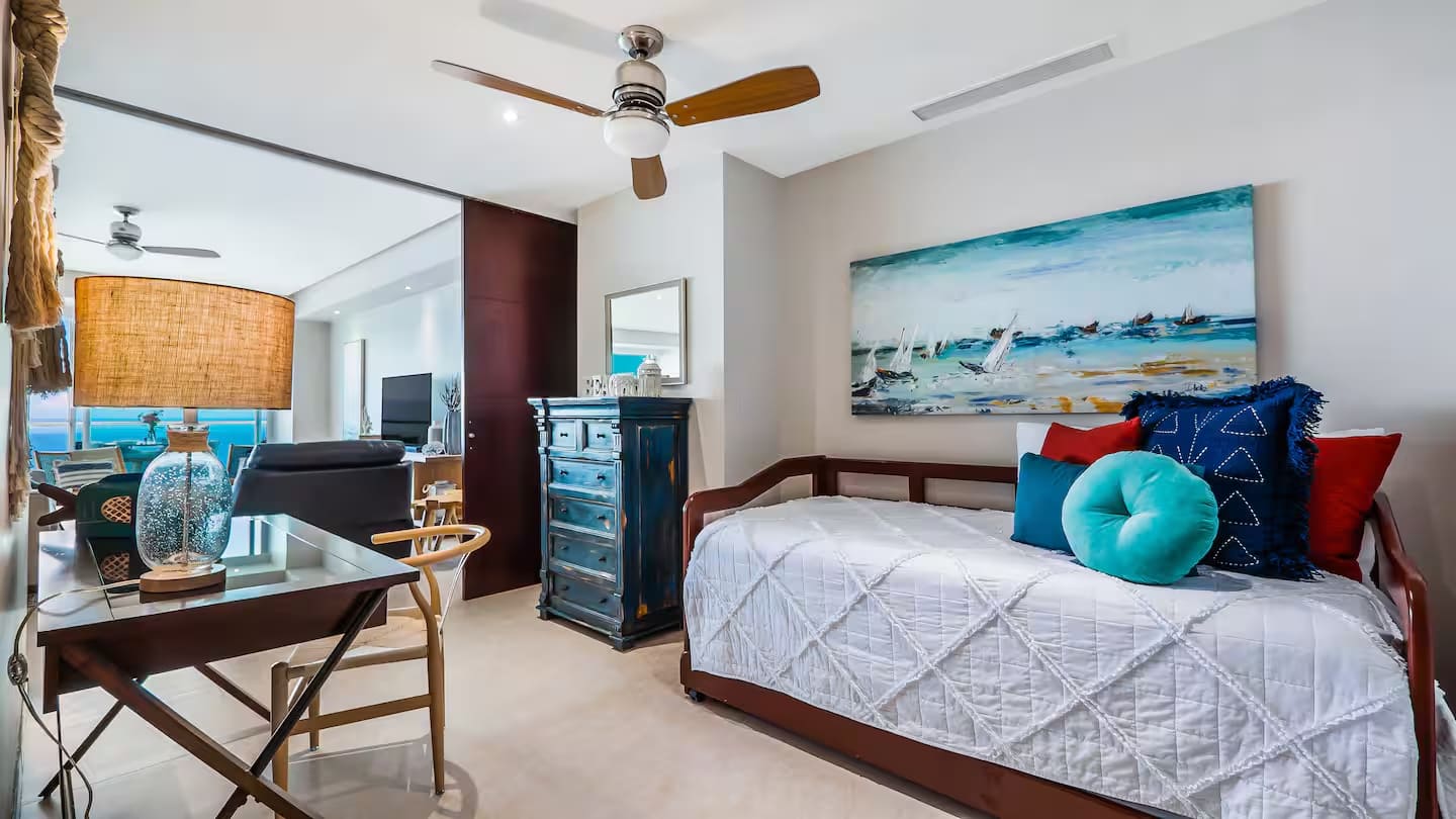 The third bedroom opens to the living area or the doors can be closed for privacy