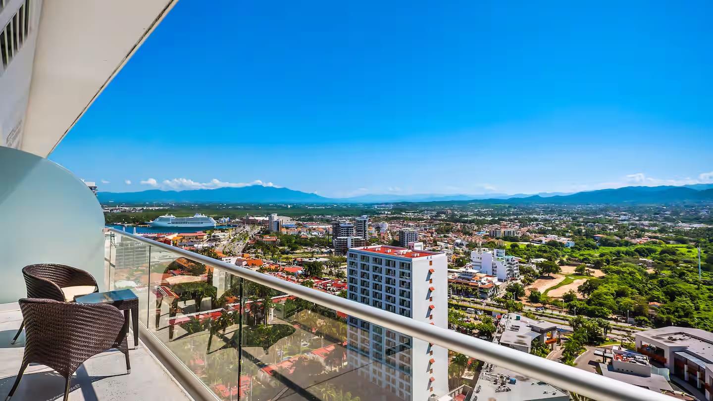 The back balcony has a view of the city and the cruise port
